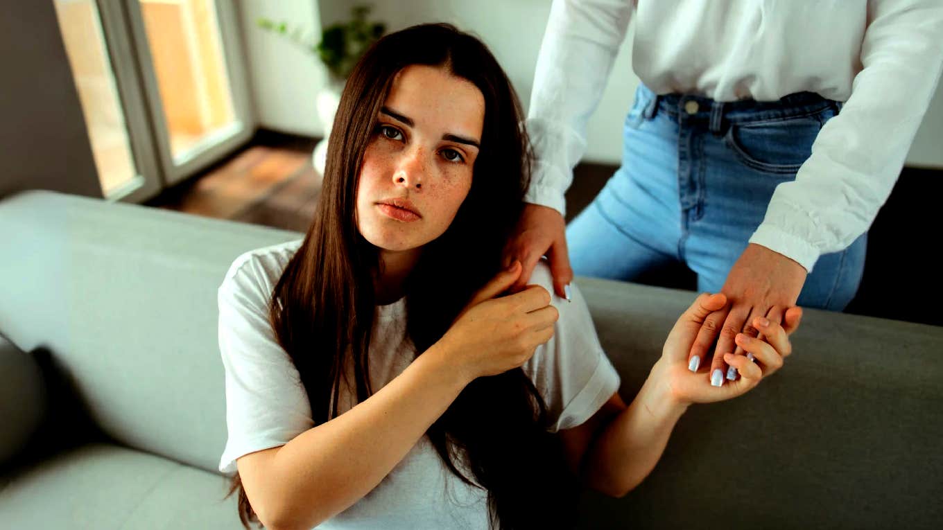 5 Psychologist-Backed Phrases That Make Things Better When Life Feels Hard sad woman being comforted