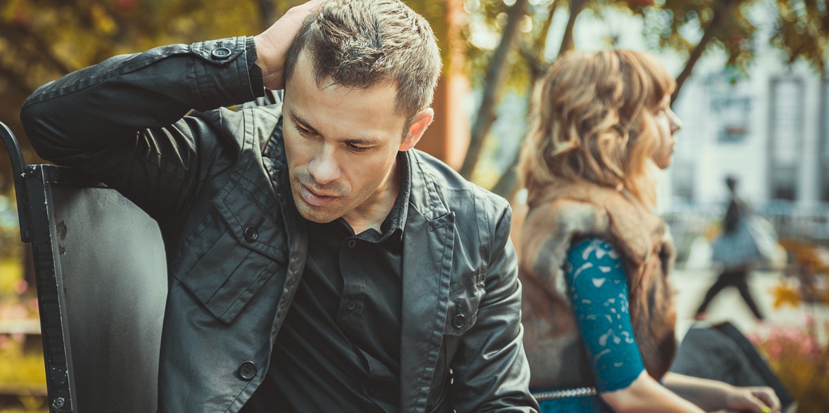 man and woman facing different directions