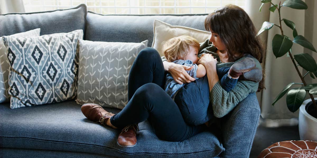 mom breastfeeding son