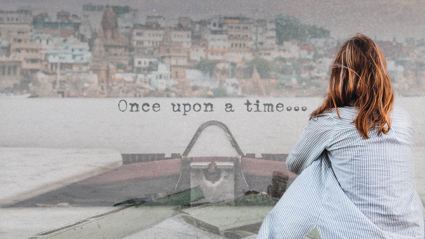 My Brutal Divorce Ended Up Being My Biggest Fairytale Woman looking at island from boat, fairy tale