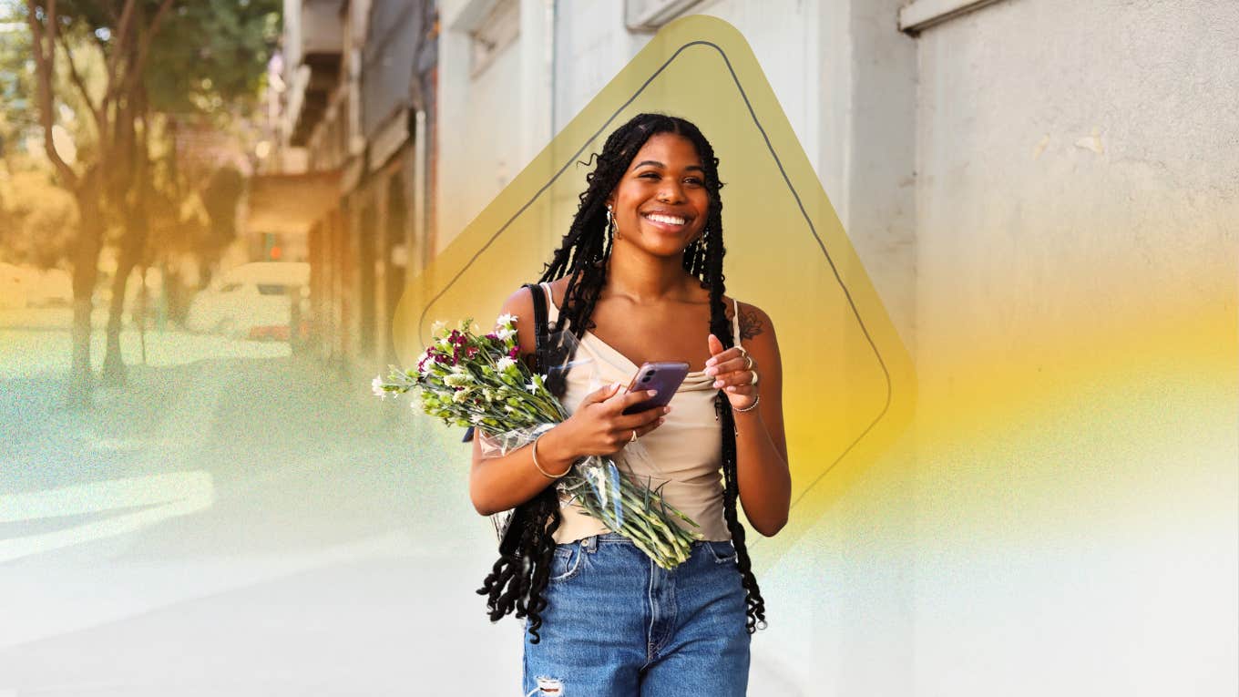 Single woman happily buying herself flowers