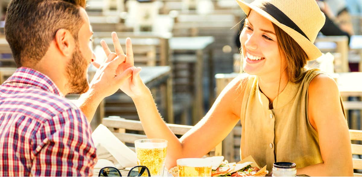 couple at a meal attracted to each other because of their accents