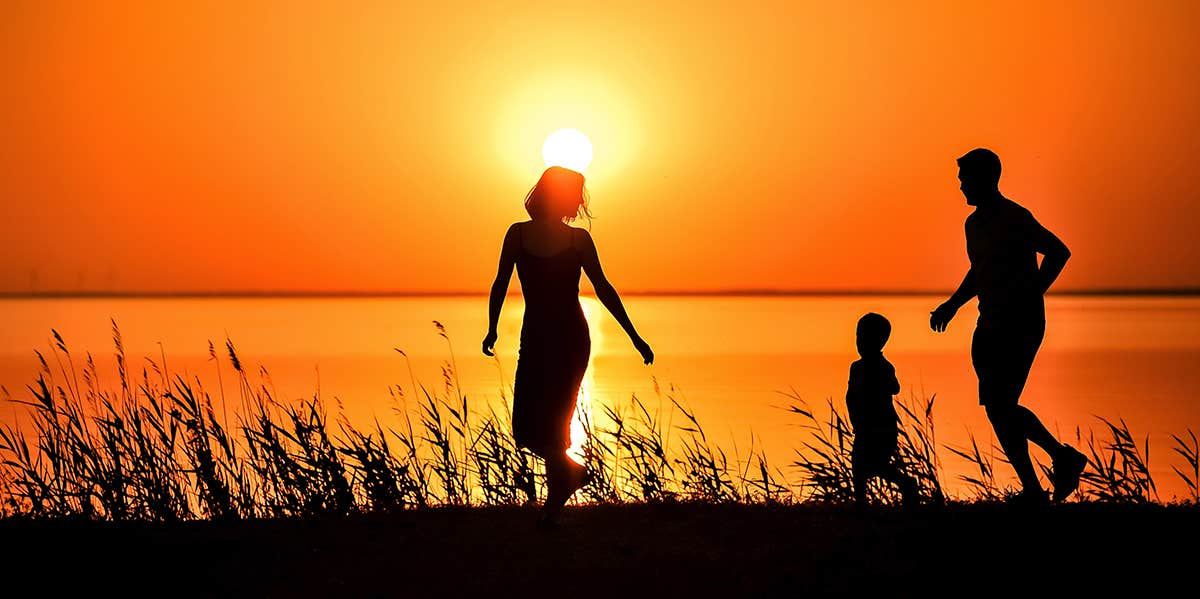 silhouette of family during sunset