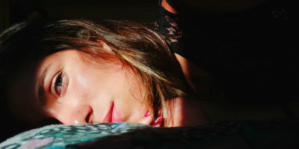 close-up of woman's face with the sun on it