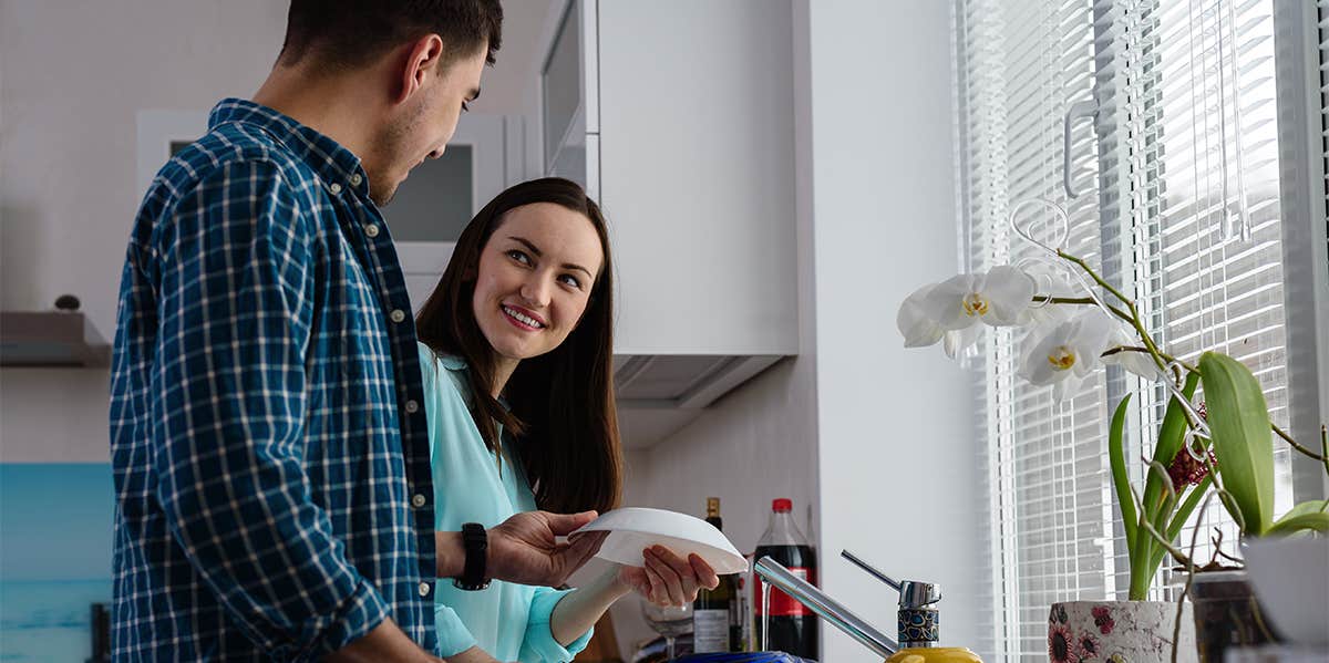 Why Couples Who Don't Split The Chores Are More Likely To Break Up couple doing the dishes together