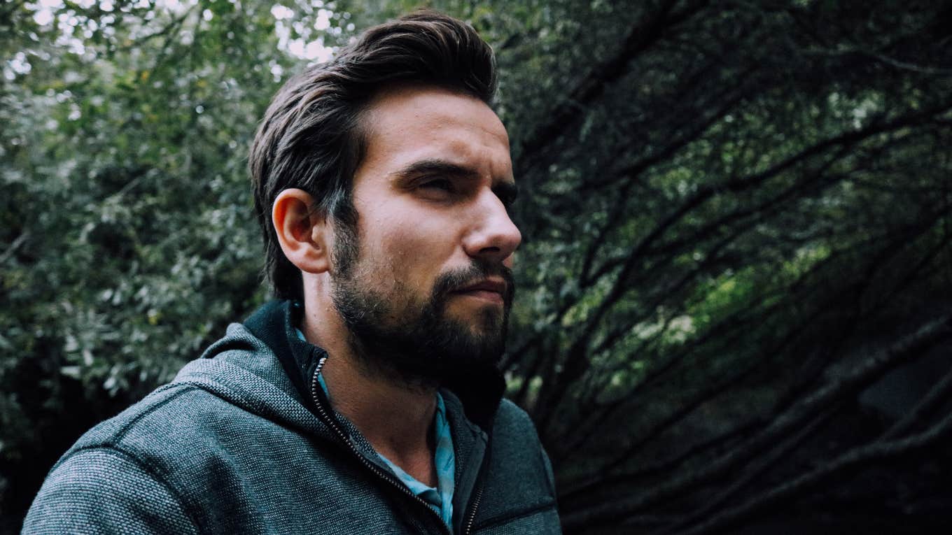3 Honest Reasons Why Men Cheat On You (Even When They're Truly In Love) man in forest