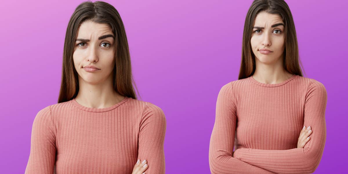 confused woman standing with her arms folded