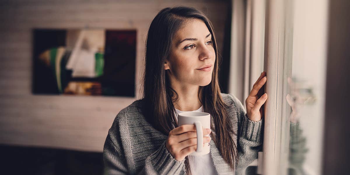 Why You Should Get Divorced At Least Once woman looking out of the window