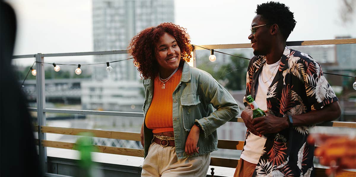 Why Gen Z Approaches Money Differently Than Previous Generations man and woman talking