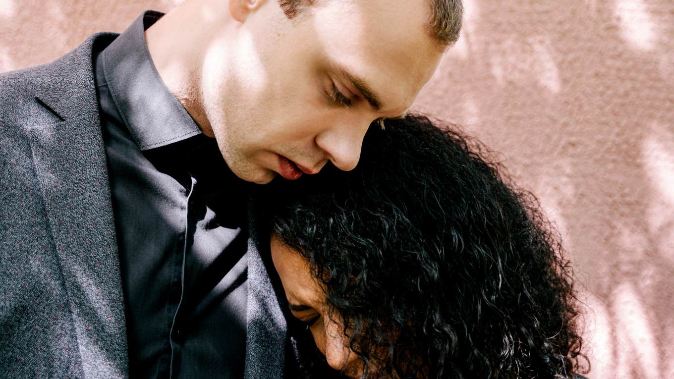 The Plain Reason Your Man Wants You Back (After He Dumped You) guy hugging girl