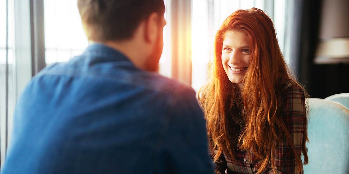 man talking to woman