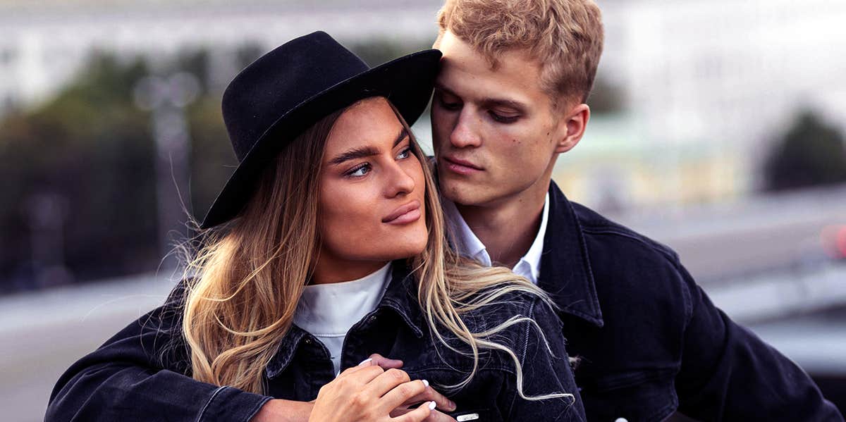Why Men With High-Conflict Personality Types Are So Frustratingly Hot man hugging woman