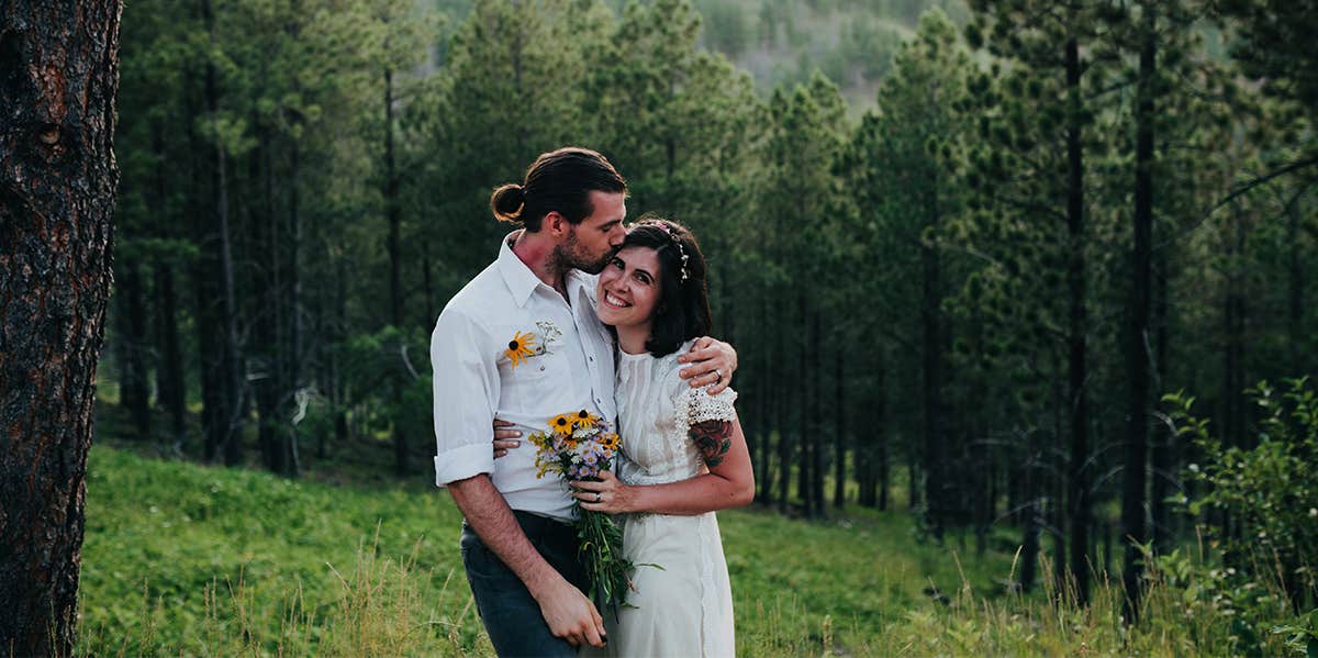 bride and groom in forest 