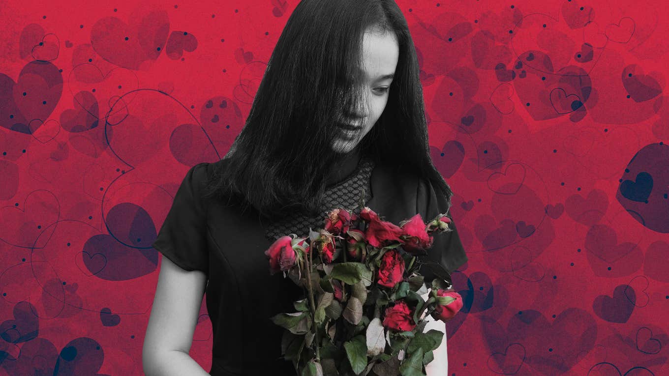 unhappy girl holding roses