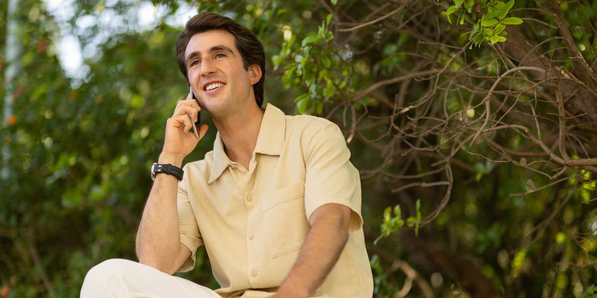 Why It's So Hard For Men To Say "I Love You" man talking on phone