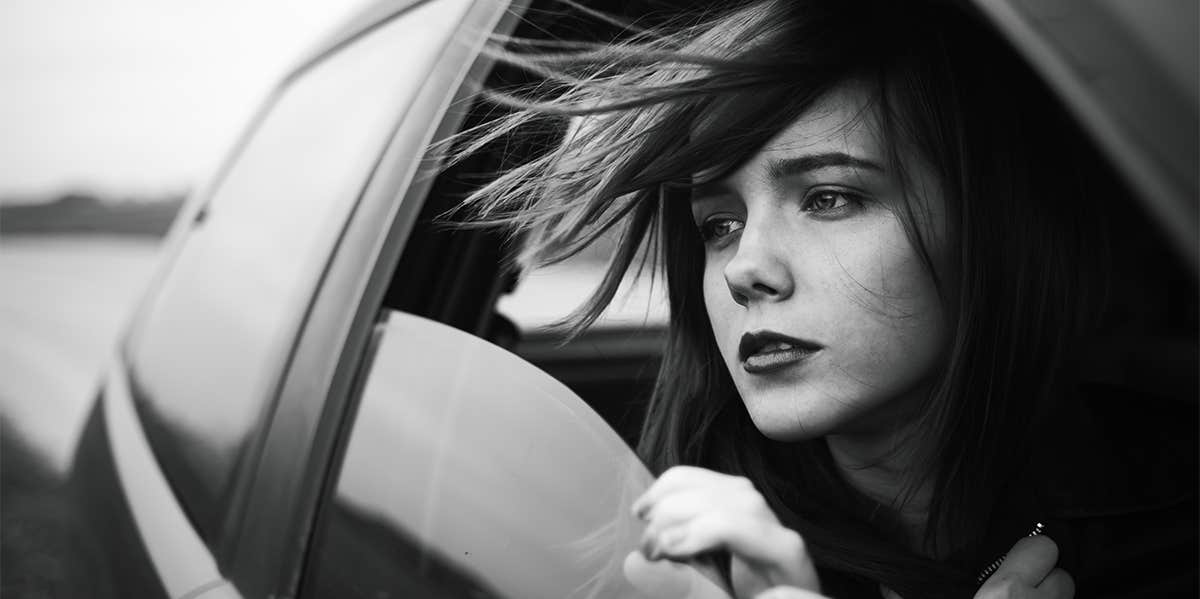 woman riding in car