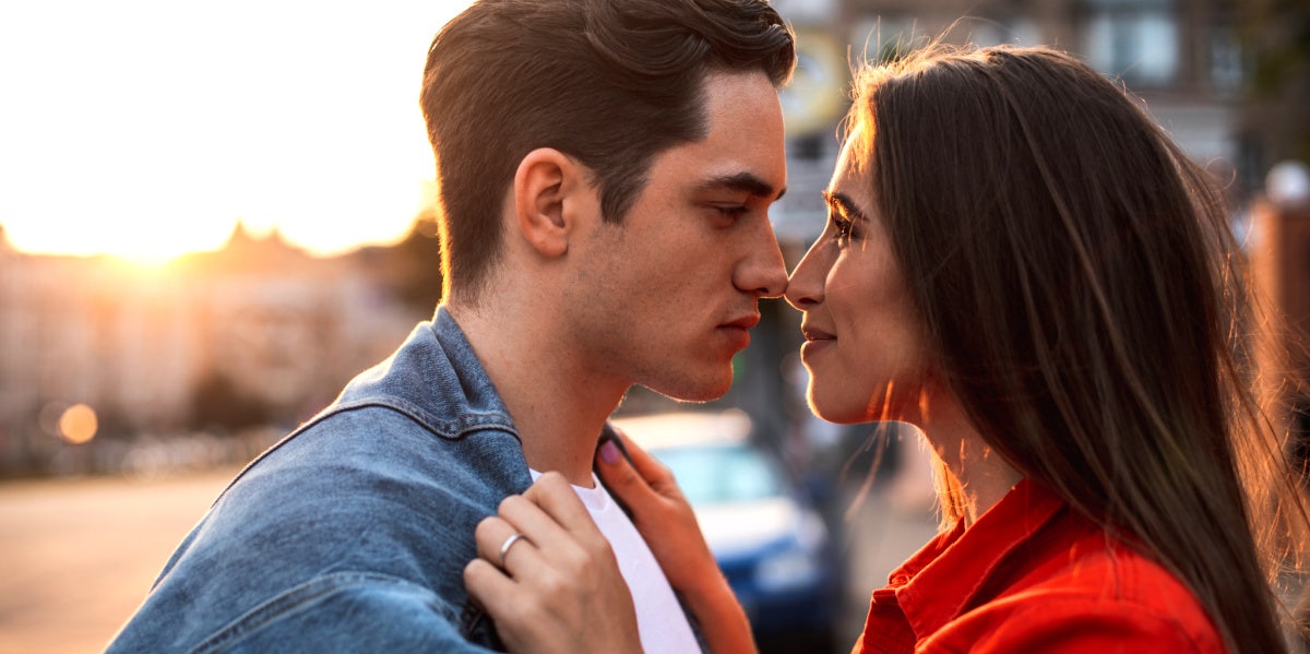 woman staring down man who has a fear of commitment