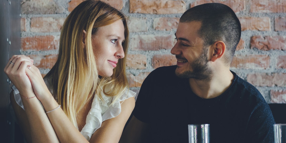 man laughing at woman