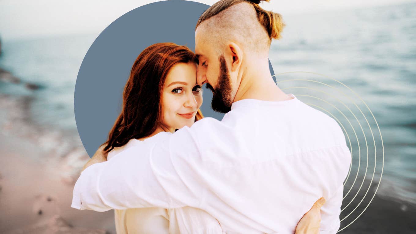 Monogamy Is Good — And It's Here To Stay couple hugging each other, woman looking over partners shoulder