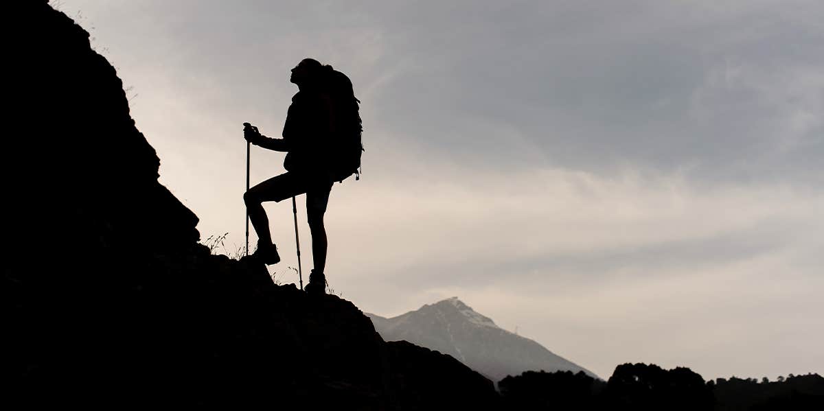 woman hiking mountain