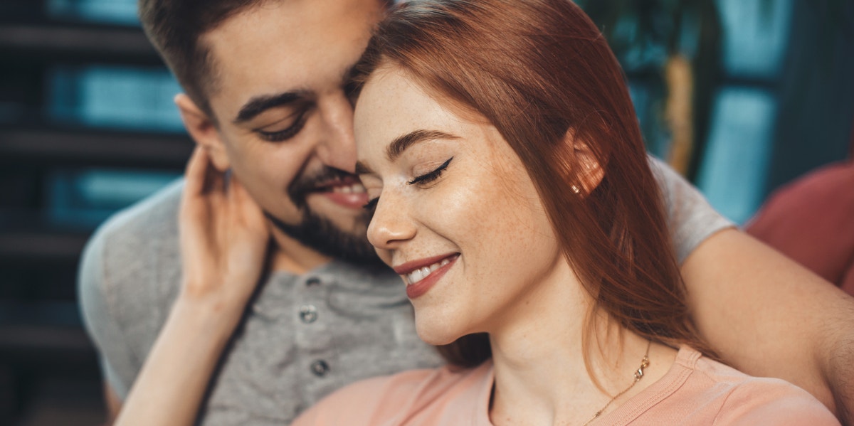 woman and man smiling