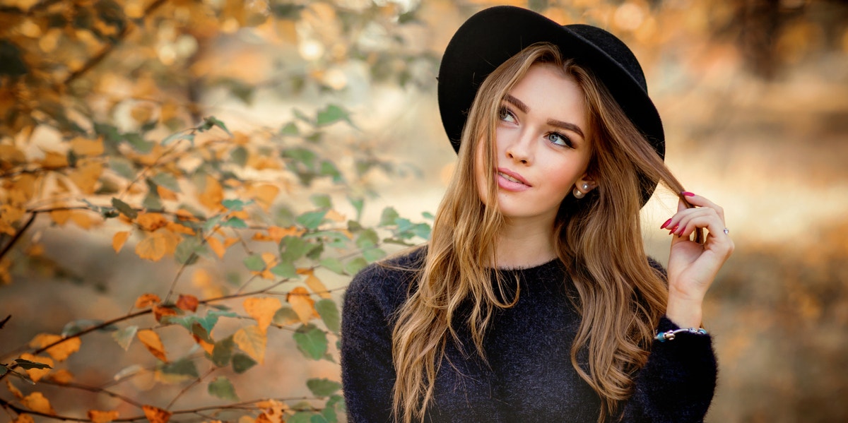 Why I Decided To Reparent Myself In My 20s woman in front of tree