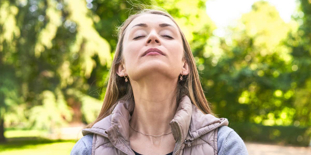 mature woman looking toward the sky