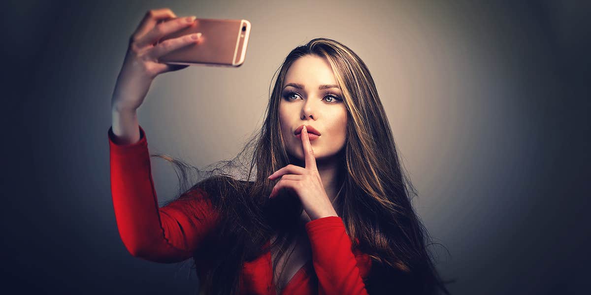 woman taking selfie