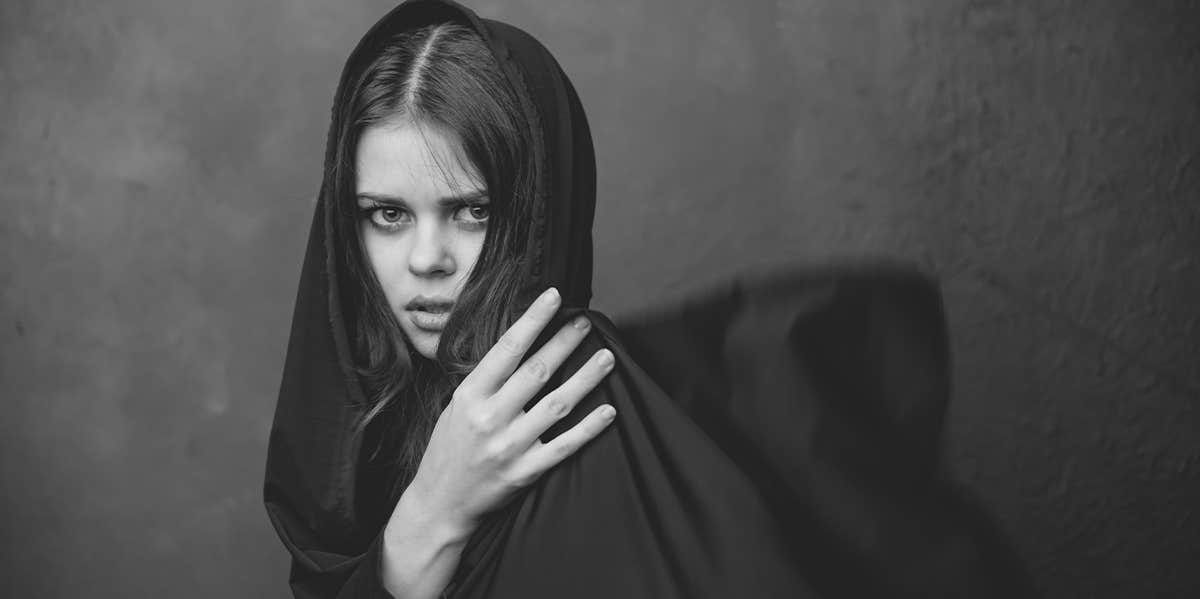 woman in scarf in black and white