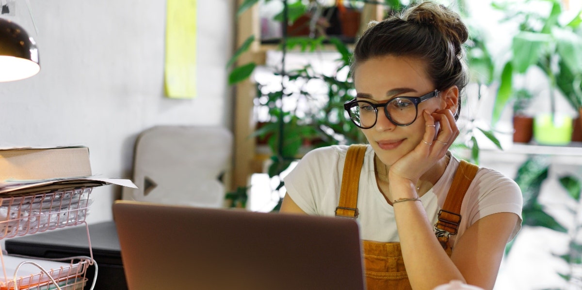 woman looking at computer screen