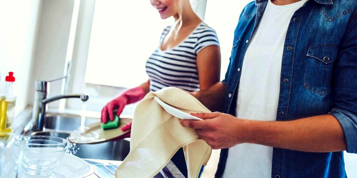 couple washing dishes