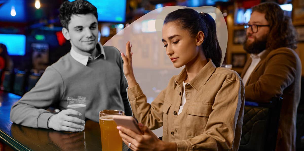 Woman rejecting man at a bar