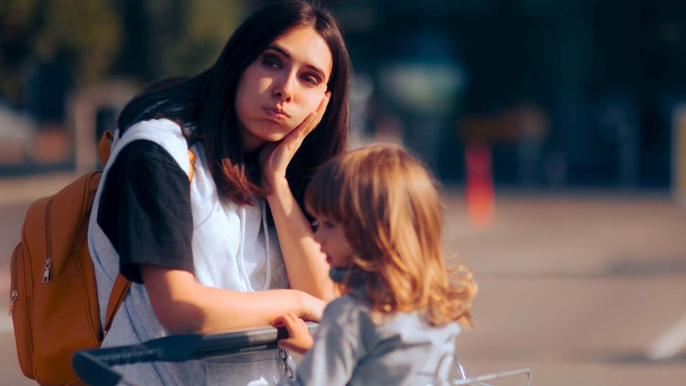 tired mom shopping with her daughter