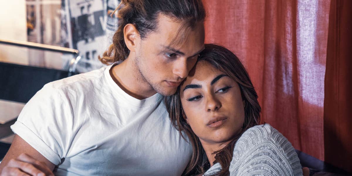 6 Reasons Your Man Won't Open Up To You guy and girl cuddling
