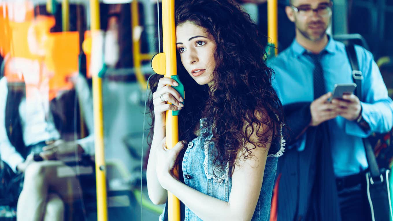 sad woman on subway