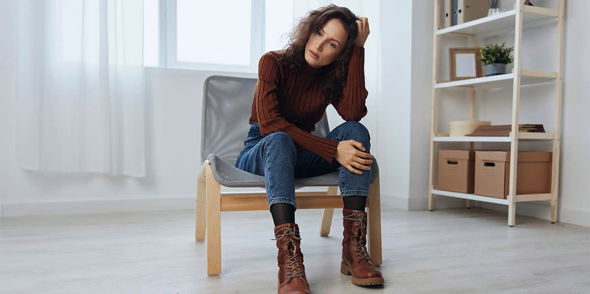 woman sitting thinking