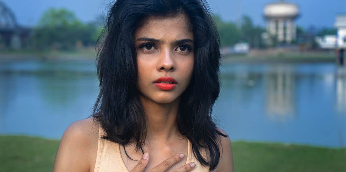Why You Need To Ignore Your Head And Go With Your Gut Sometimes woman thinking deeply