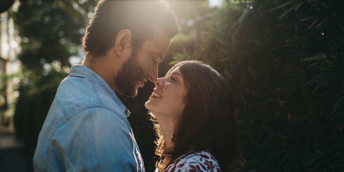 woman and man kissing