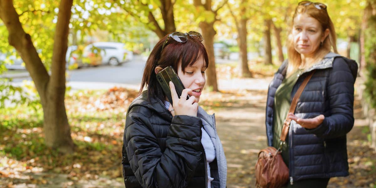 woman asking for her phone after letting stranger use it