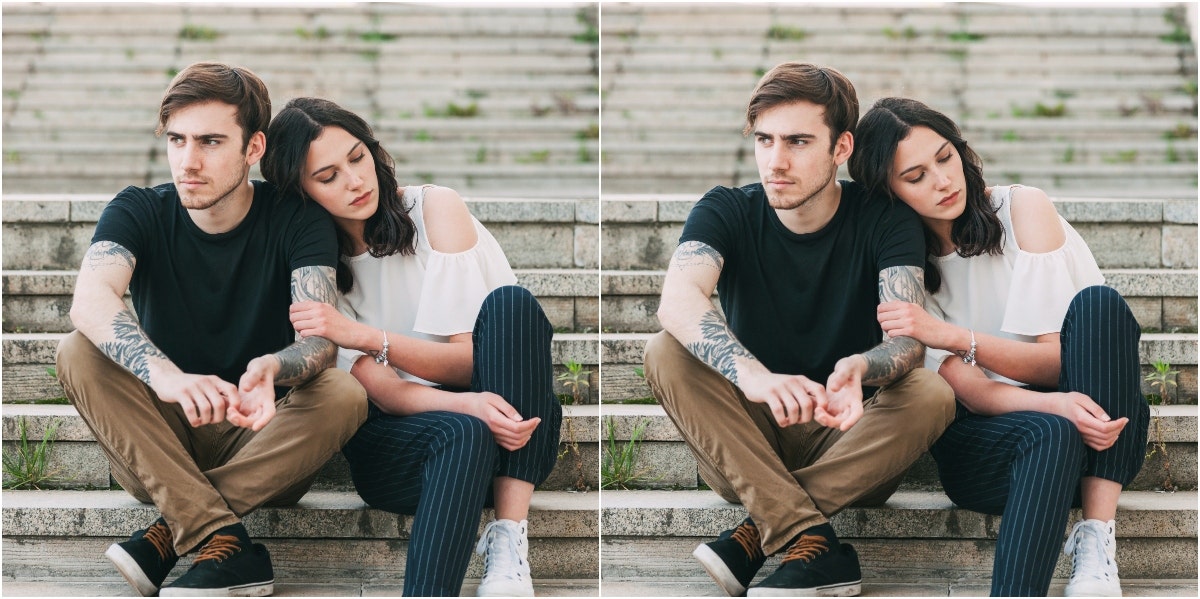 why you're avoiding couples therapy sad couple sitting on stairs