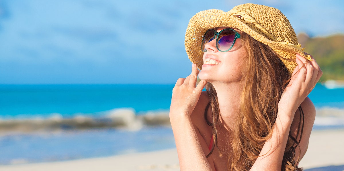 woman laying on beach