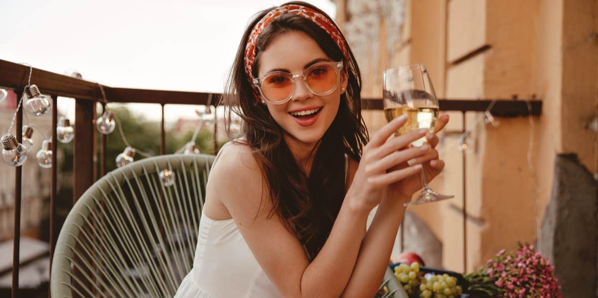 Wine, Chocolate, Spicy Food Diet Makes You Live Longer, Says Science woman holding wine