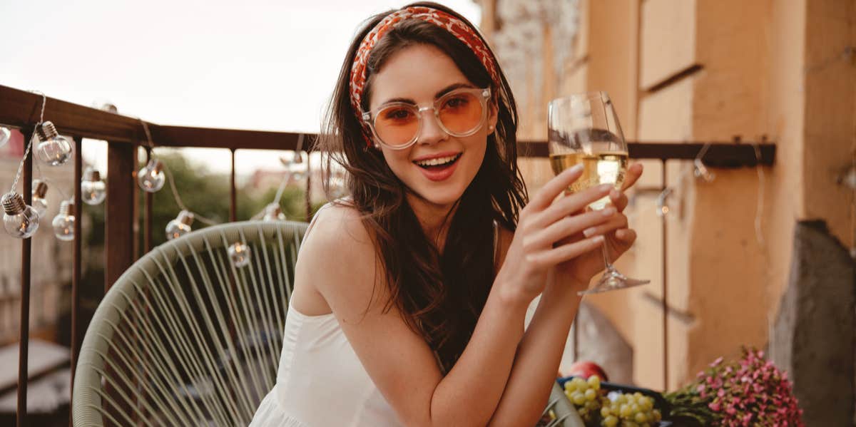 woman holding wine