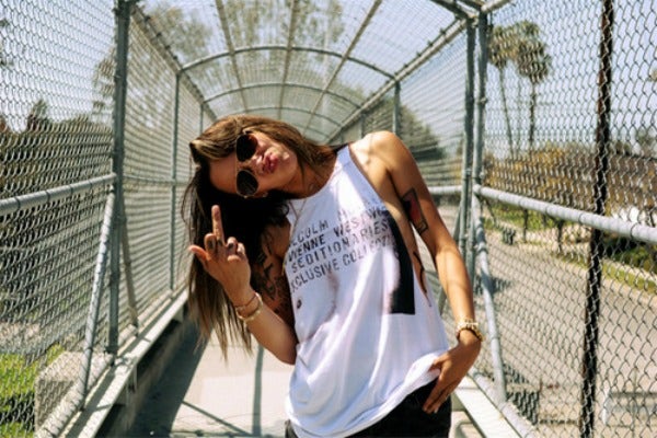 Woman flipping the bird. Woman flipping the bird.
