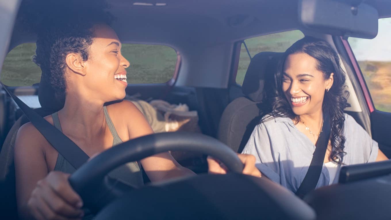 Friends driving in the car together. 