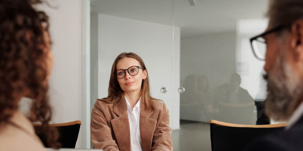 Woman wearing glasses at job interview