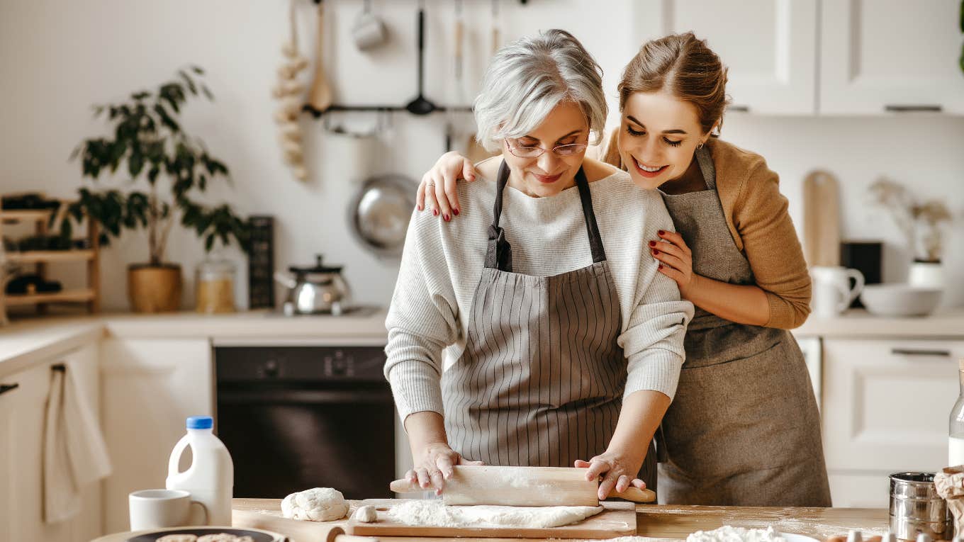 mother-in-law and daughter-in-law daughter cooking in kitchen