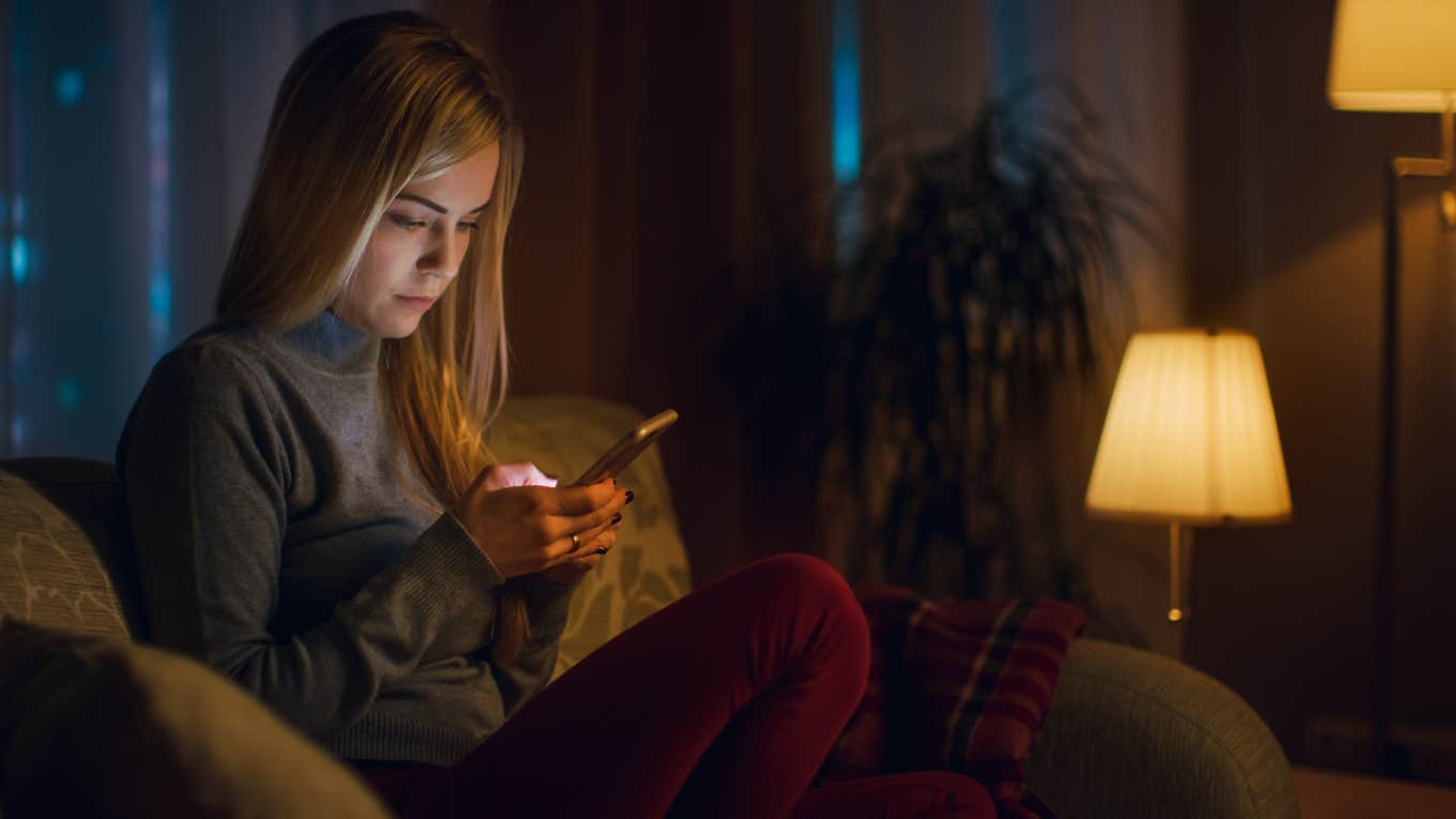 woman looking at her phone