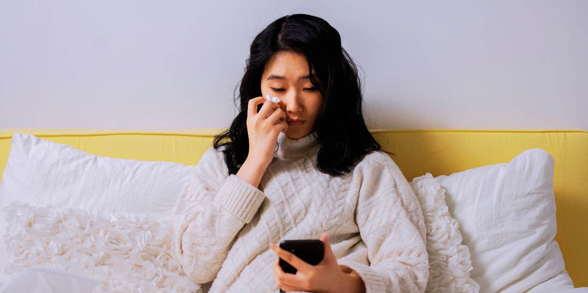 Woman crying on the phone