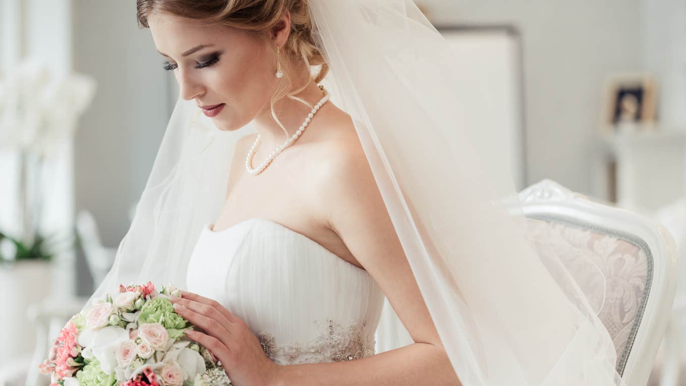 bride looking pensive on wedding day